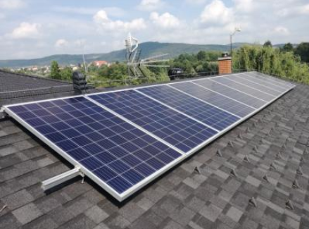 Solar panels on a shingle roof 